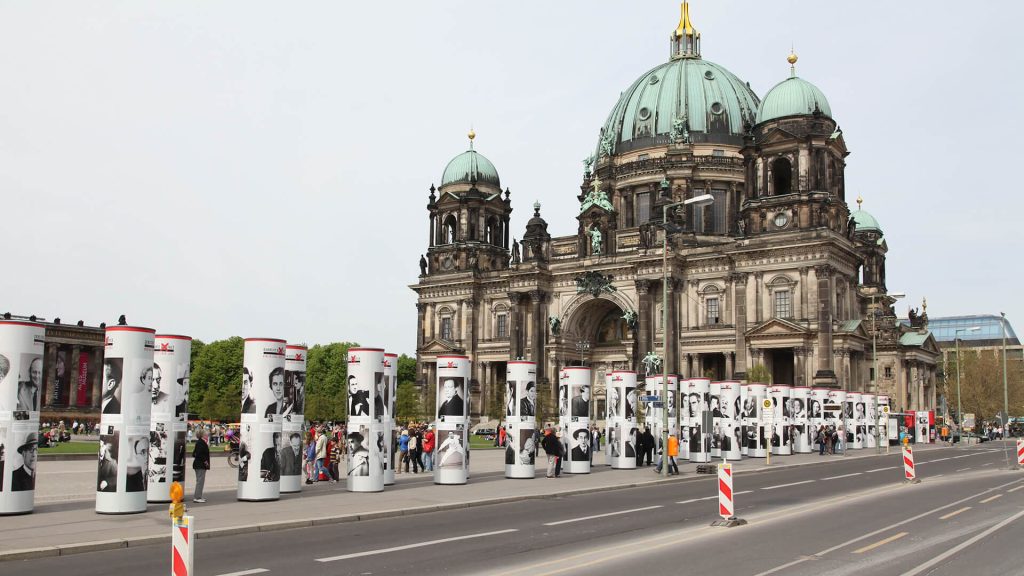 The "Destroyed Diversity" project. Exhibition section on Museum Island. Columns in front of the Berlin Cathedral.