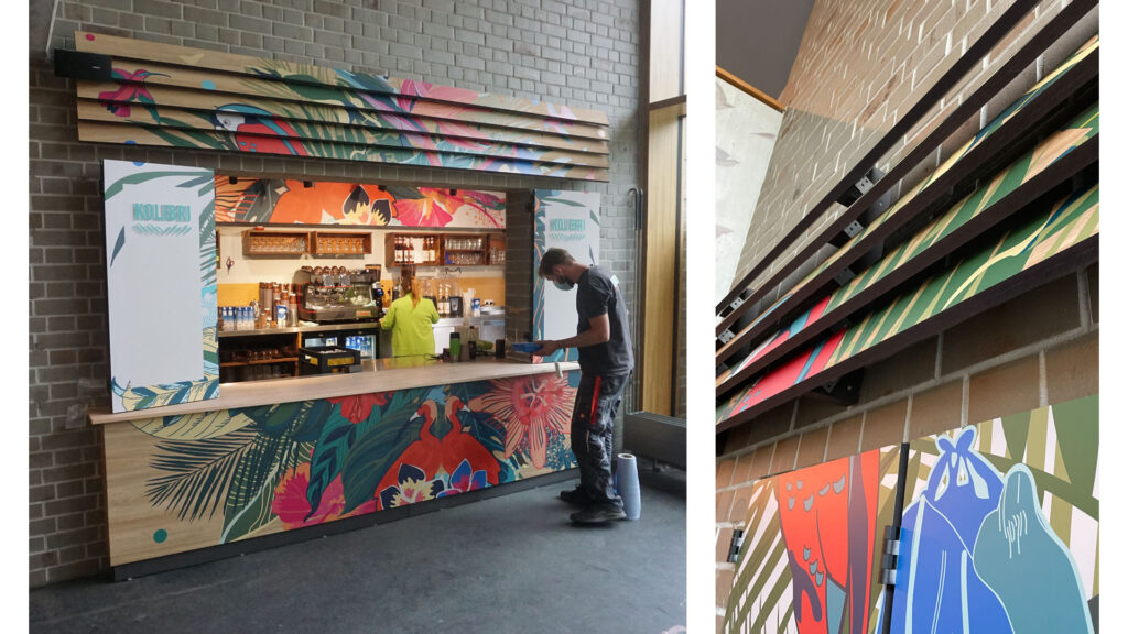 Sales counter at Berlin Zoo being checked by a photo advertising employee.