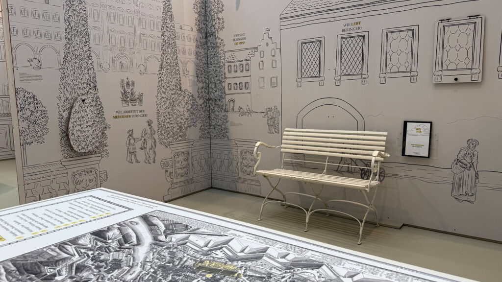 Luegenstein Museum Würzburg: Finished view of Room 1, POV from table to bench.